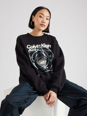 Calvin Klein Jeans Sweatshirt 'GALAXY' i svart: framsida