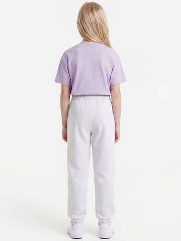 Nike Sportswear Tapered Bukser 'STUDIO' i grå