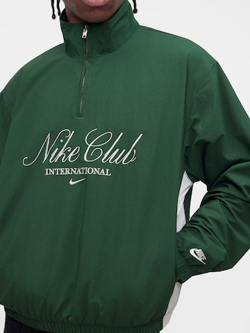 Nike Sportswear Prehodna jakna 'Club' | zelena barva
