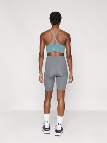 UNDER ARMOUR Скинни Спортивные штаны 'Motion' в Серый