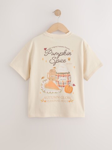 Tricou de la Next pe bej