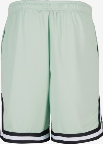Karl Kani Lużny krój Spodnie w kolorze zielony
