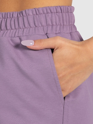 Loosefit Pantalon de sport ' Nurya ' Smilodox en violet