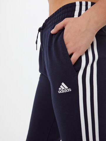 ADIDAS SPORTSWEAR Tapered Sportbyxa 'Essentials French Terry 3-Stripes' i blå