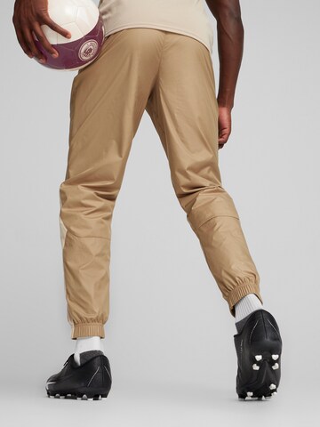PUMA Tapered Workout Pants 'MCFC Prematch' in Beige