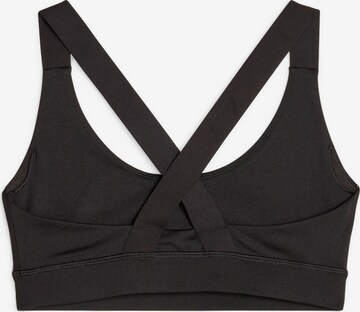 PUMA Bustier Sport bh in Zwart