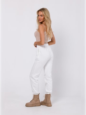 made of emotion - Tapered Pantalón en beige