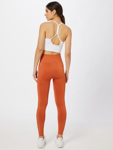 Superdry - Skinny Pantalón deportivo 'Flex' en naranja