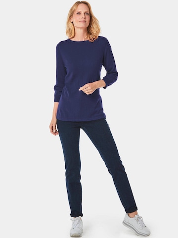 Goldner Pullover in Blau