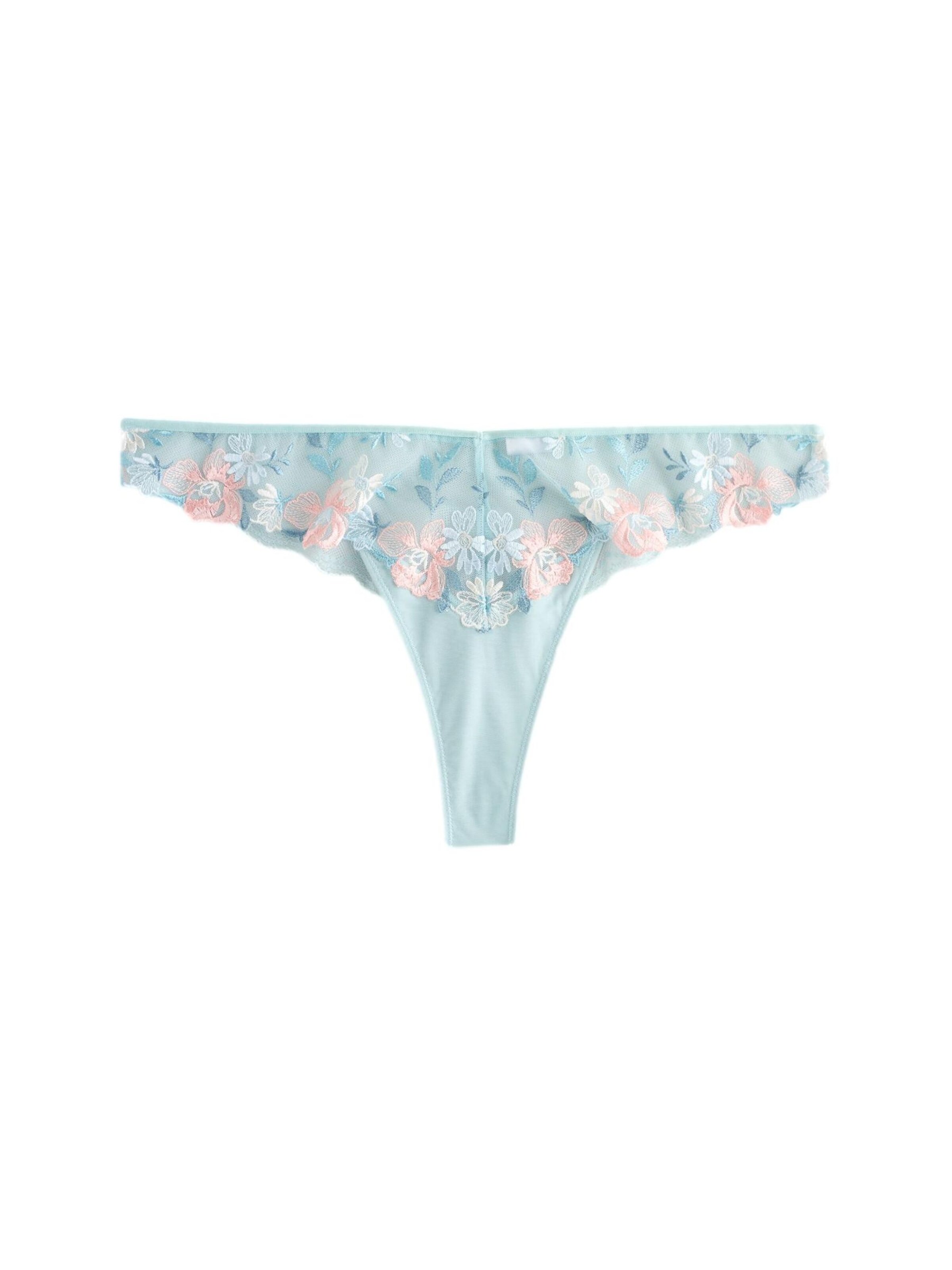 Next String i blå: framsida