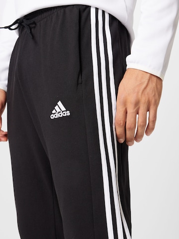 ADIDAS SPORTSWEAR Slimfit Παντελόνι φόρμας 'Essentials' σε μαύρο