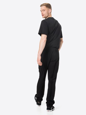 ABOUT YOU Limited Regular Trousers 'Lian' in Black