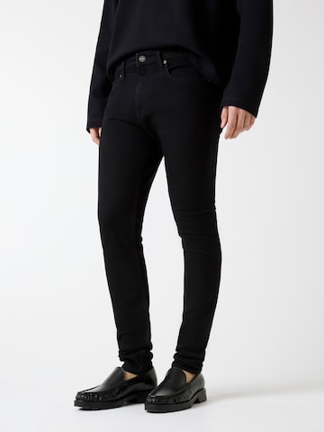 GUESS JEANS - Skinny Vaquero 'G12' en negro: frente