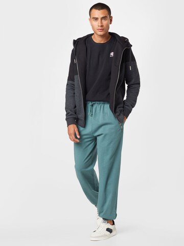 Urban Classics Loose fit Pants in Blue