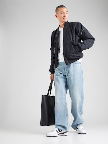 Champion Authentic Athletic Apparel Sweatshirt i vit