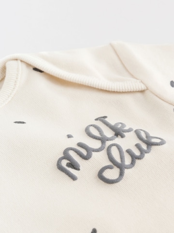 NextDječji bodi - bež boja