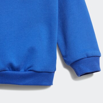 ADIDAS SPORTSWEAR - Skinny Chándal 'Badge Of Sport French Terry' en azul