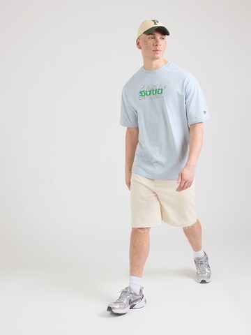 NEW ERA Póló 'NE CHARACTER' - kék