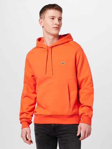 Felpa di LACOSTE in arancione: frontale