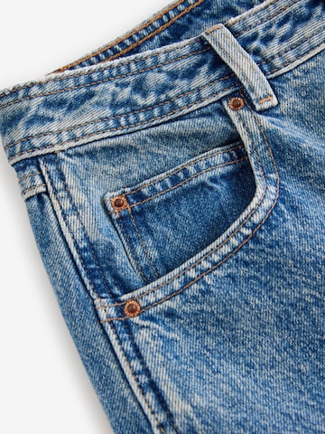 Next - Pierna ancha Pantalón vaquero cargo en azul