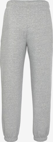 Champion Authentic Athletic Apparel Tapered Sporthose in Grau