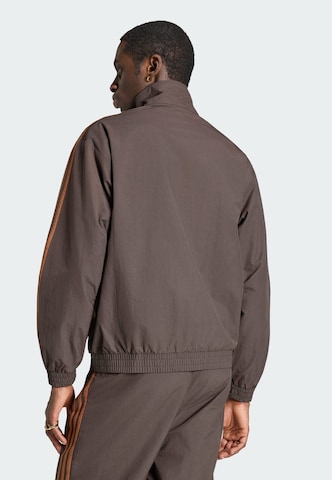 ADIDAS ORIGINALS - Chaqueta de entretiempo 'Firebird' en marrón