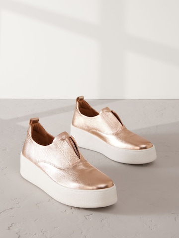 Slip on Next en or