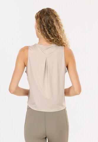 Athlecia Sports top 'Pacy V2' in Beige