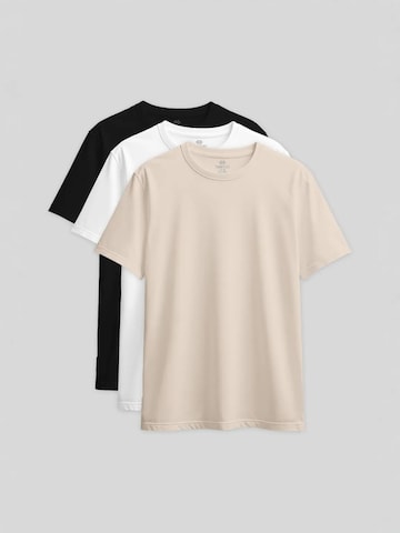 Maglietta di Tommy Life in beige: frontale