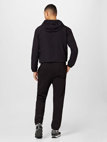 Champion Authentic Athletic Apparel Tapered Hose in Schwarz