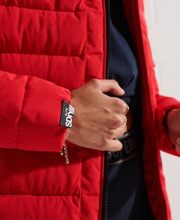Manteau d’hiver 'Artic' Superdry en rouge