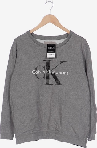 Calvin Klein Jeans Langarmshirt L in Grau: predná strana