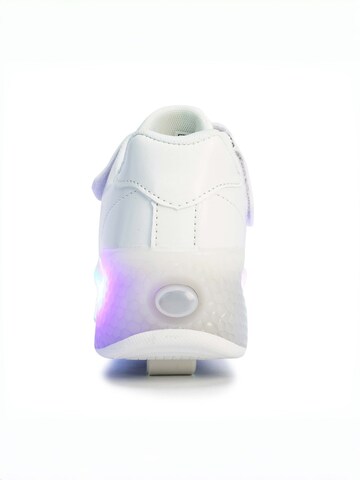 HUSKSWARE Inline and Roller Skates in White
