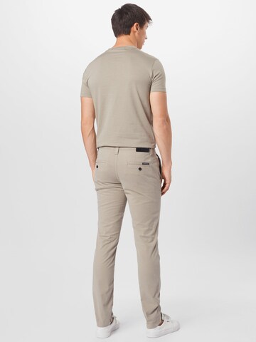 Calvin Klein Jeans Skinny Chinosy w kolorze beżowy