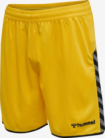 Hummel Regular Workout Pants 'Poly' in Yellow