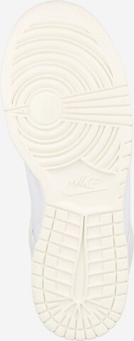 Baskets basses Nike Sportswear en blanc