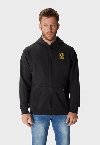 Oldskull Sweatjacke 'Wrldvibe Return to Wild' in Schwarz: Vorderseite