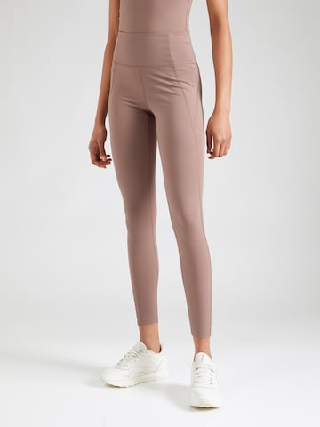 Girlfriend Collective Skinny Workout Pants in Brown: front