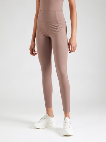 Skinny Pantalon de sport Girlfriend Collective en marron : devant