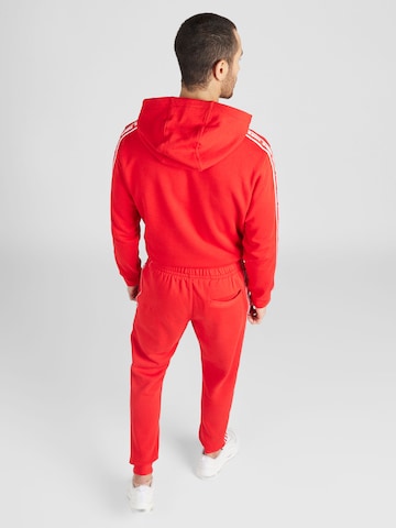 Nike Sportswear Sweatsuit 'CLUB FLEECE' in Red