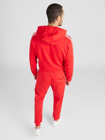 Nike Sportswear Strój do biegania 'CLUB FLEECE' w kolorze czerwony