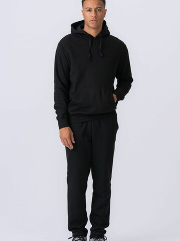 Pull-over ' Essential Hoodie ' TEESHOPPEN en noir