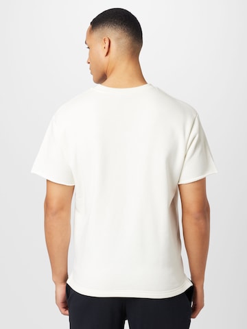 T-Shirt fonctionnel 'Project Rock' UNDER ARMOUR en beige