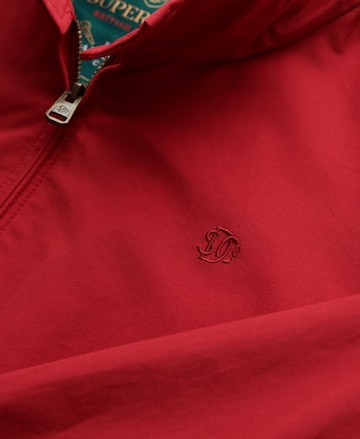 Veste mi-saison Superdry en rouge