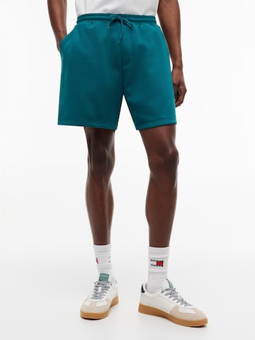 Loosefit Pantalon Tommy Jeans en vert : devant