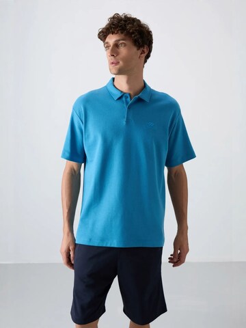 T-Shirt Tommy Life en bleu : devant