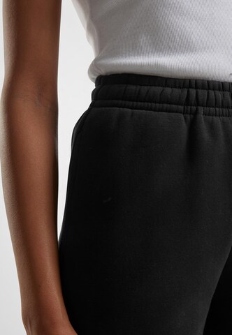 Urban Classics Конический (Tapered) Штаны в Черный