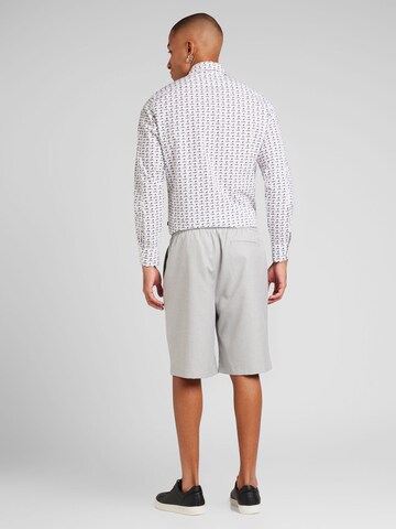 Loosefit Pantaloni di TOPMAN in grigio
