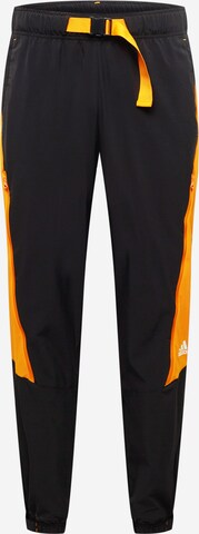 ADIDAS SPORTSWEAR Tapered Workout Pants 'Travel Vent' in Black: front