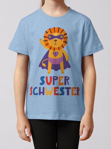T-Shirt 'Löwe Superschwester' watabout.kids en bleu